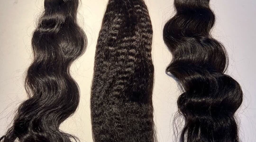 Various hair extensions at Jaylicious Beauty, Ballito, Kwazulu-natal, ZA showcasing silky and wavy textures.