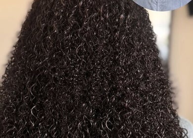 Lustrous curly hairstyle at Jaylicious Beauty, Ballito, Kwazulu-natal, ZA.