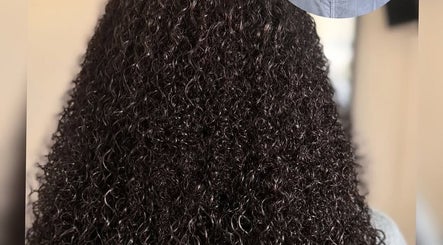Lustrous curly hairstyle at Jaylicious Beauty, Ballito, Kwazulu-natal, ZA.