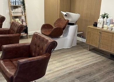 Elegant salon chairs and wash station at C.B Colour in Portishead, England, GB.