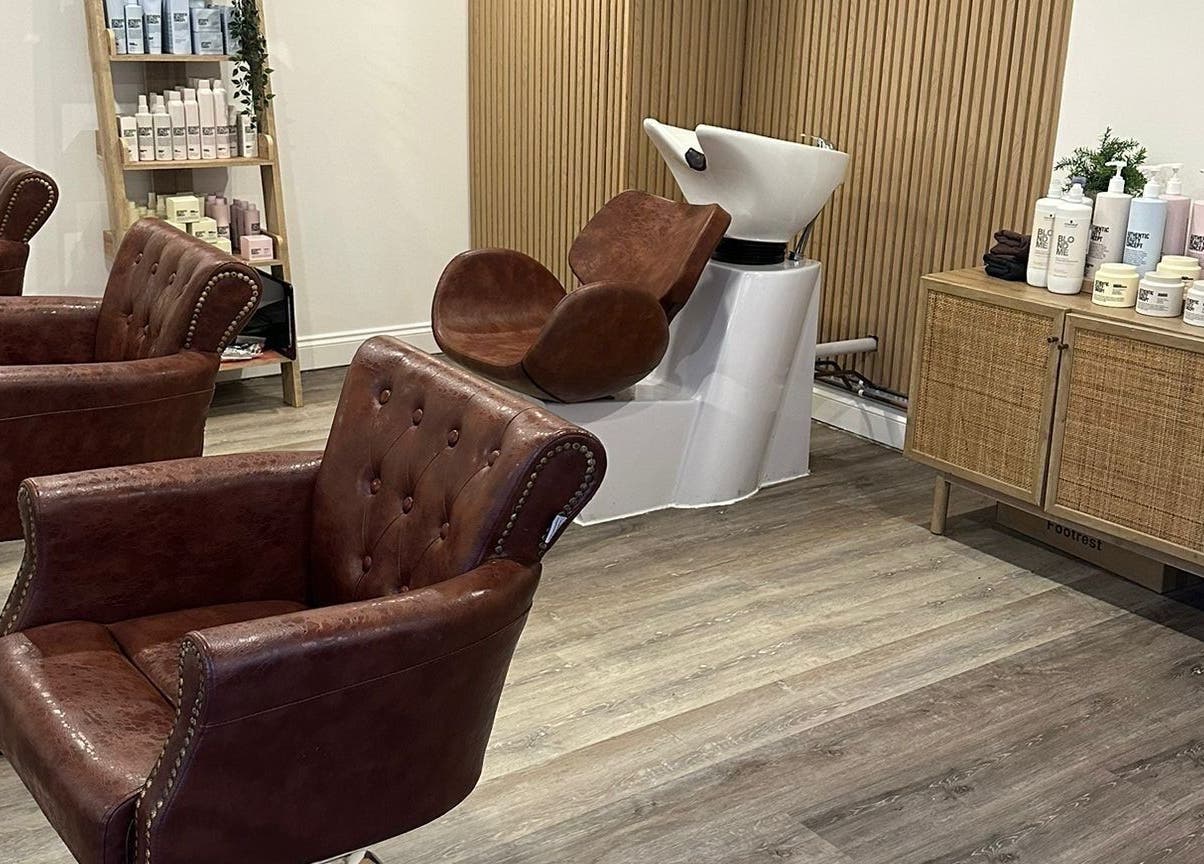 Elegant salon chairs and wash station at C.B Colour in Portishead, England, GB.