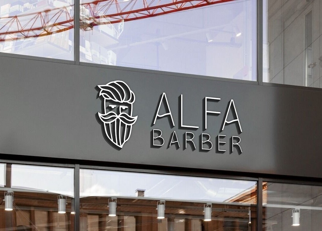 Elegant facade sign of Alfa Barber - حلاق ألفا, located in Buraydah, Al Qassim Province, SA.
