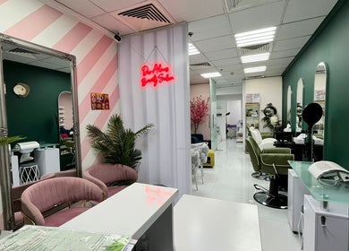 Interior of Dar Almas Beauty Salon in Dubai, Dubai, AE, featuring stylish decor and seating.