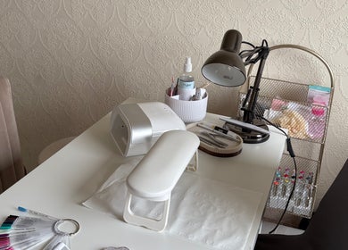 Nail station at The Nail Garden, Old Woods, Bomere Heath, England, GB with tools and decor.