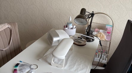 Nail station at The Nail Garden, Old Woods, Bomere Heath, England, GB with tools and decor.