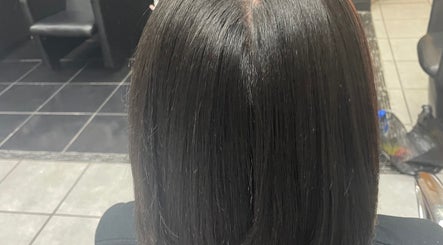 Sleek hairstyle done at Ryi Perfect’d It in Dayton, Ohio, US, showcasing a smooth, professional finish.