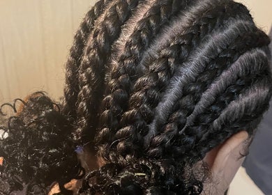 Intricate braiding hairstyle at Ryi Perfect’d It in Dayton, Ohio, US showcasing expert hairstyling.