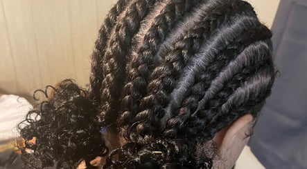 Intricate braiding hairstyle at Ryi Perfect’d It in Dayton, Ohio, US showcasing expert hairstyling.