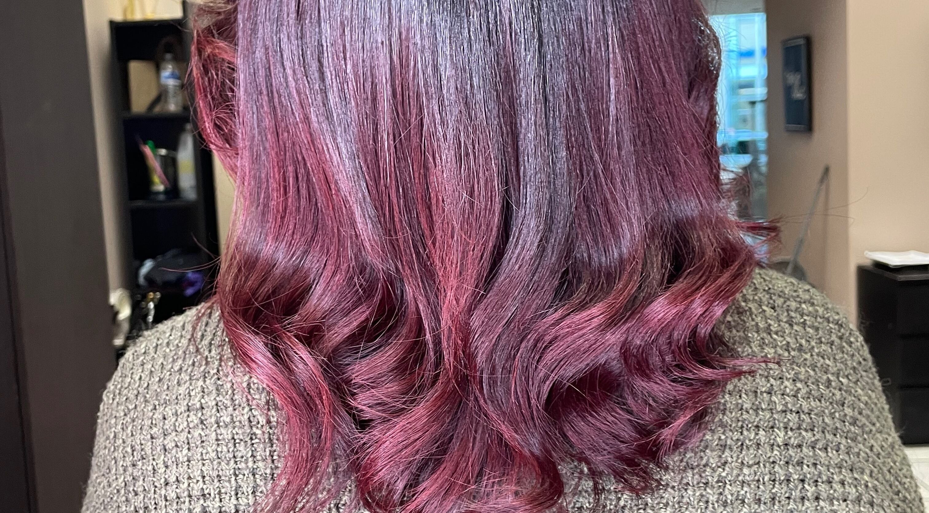 Rich purple wavy hairstyle at Ryi Perfect’d It, Dayton, Ohio, US, showcasing expert hair coloring.