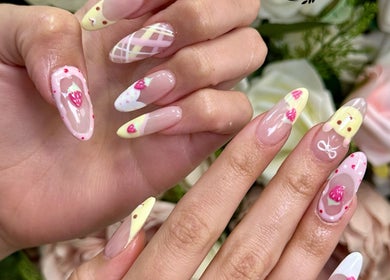 Elegant nail art at Beauty Style Salon, Merstham, featuring intricate floral designs in soft pastels.