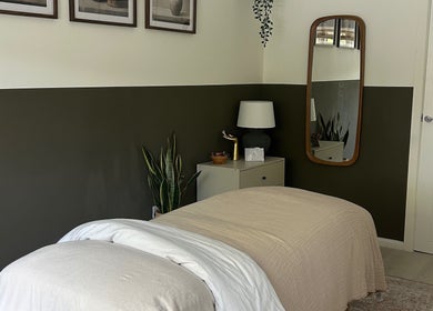 Relaxing therapy room at Skin And Soul, New Milton, England, GB, featuring cozy bedding and soothing decor.