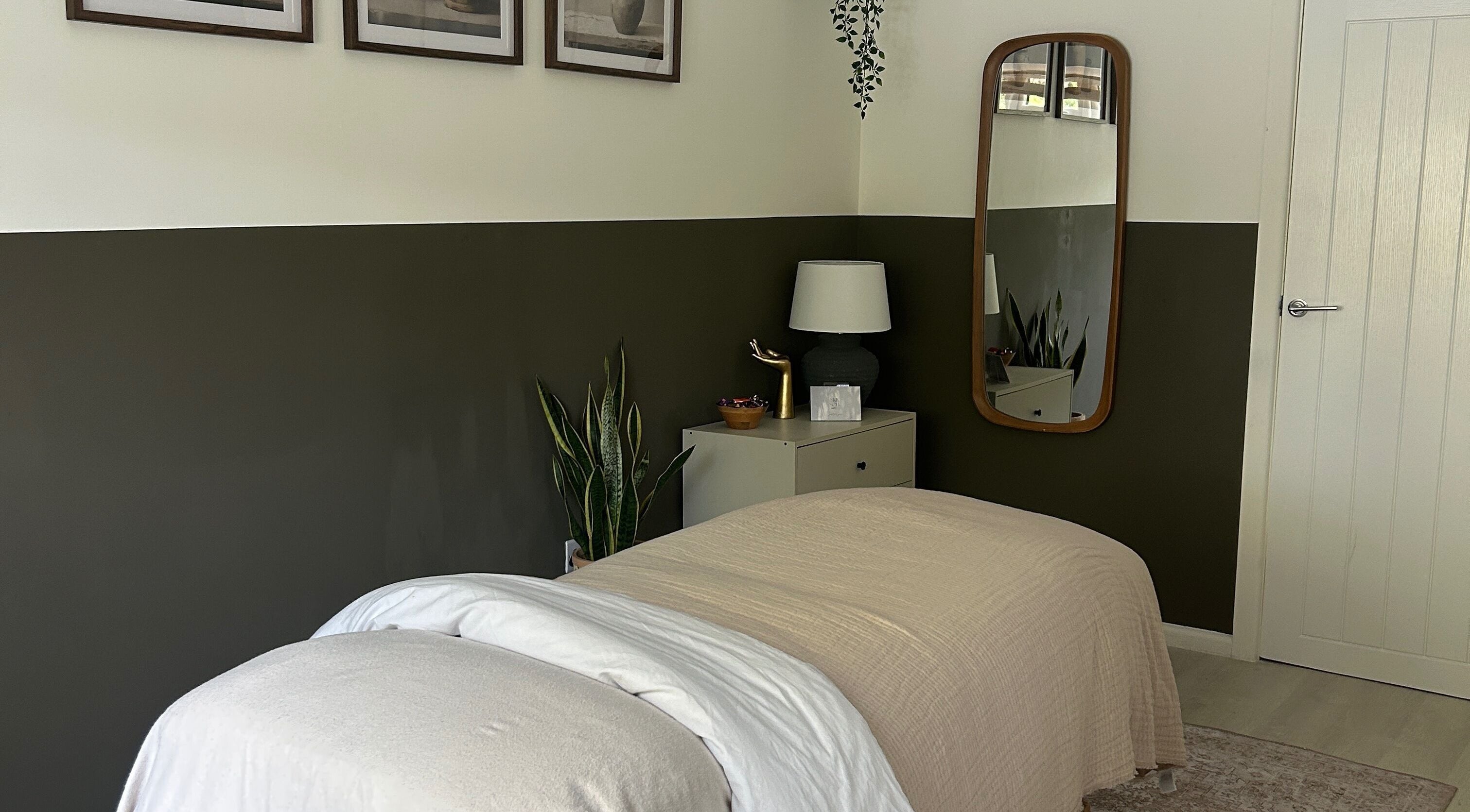 Relaxing therapy room at Skin And Soul, New Milton, England, GB, featuring cozy bedding and soothing decor.