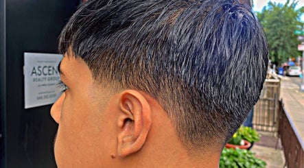 Close-up of a stylish haircut at Magic_cut, New York, New York, US, highlighting expert styling details.