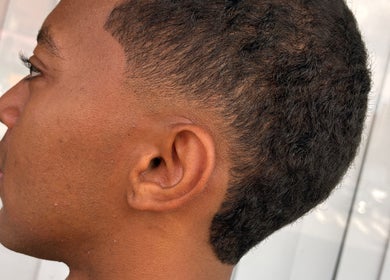Close-up of a sleek fade haircut at Magic_cut in New York, New York, US.