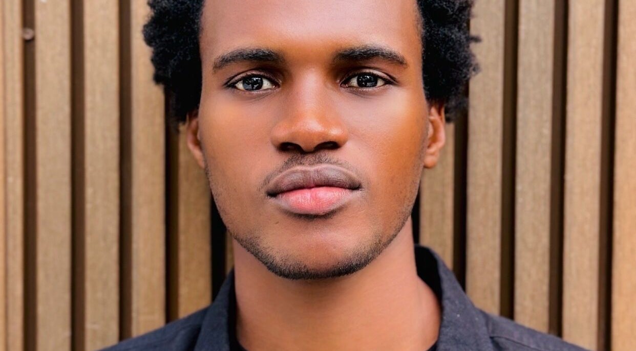 Close-up portrait at Magic Hand Cut, showcasing trendy hairstyle in New York, New York, US.