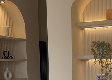 Cozy alcove decor at Styled by Maja, Tranent, Scotland, GB, featuring stylish lighting and ornaments.