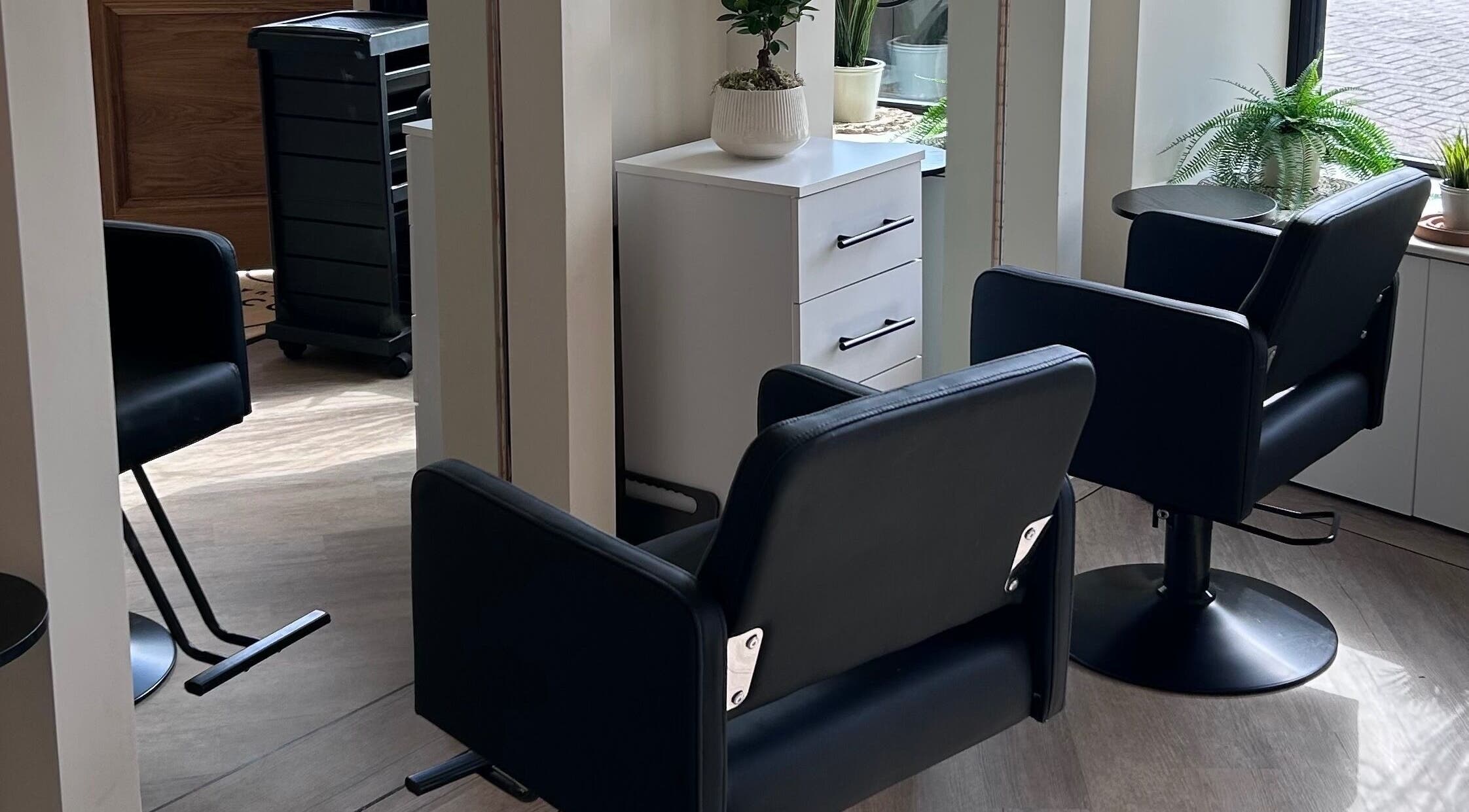Modern salon chairs and decor at Styled by Maja, Tranent, Scotland, GB.