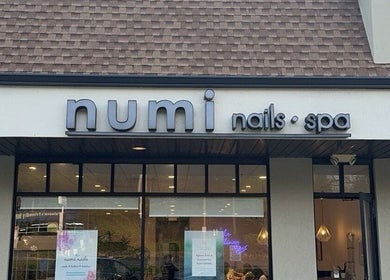 Exterior of NUMI NAILS & SPA in Hillsdale, New Jersey, US, showcasing its elegant storefront.