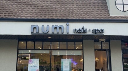 Exterior of NUMI NAILS & SPA in Hillsdale, New Jersey, US, showcasing its elegant storefront.