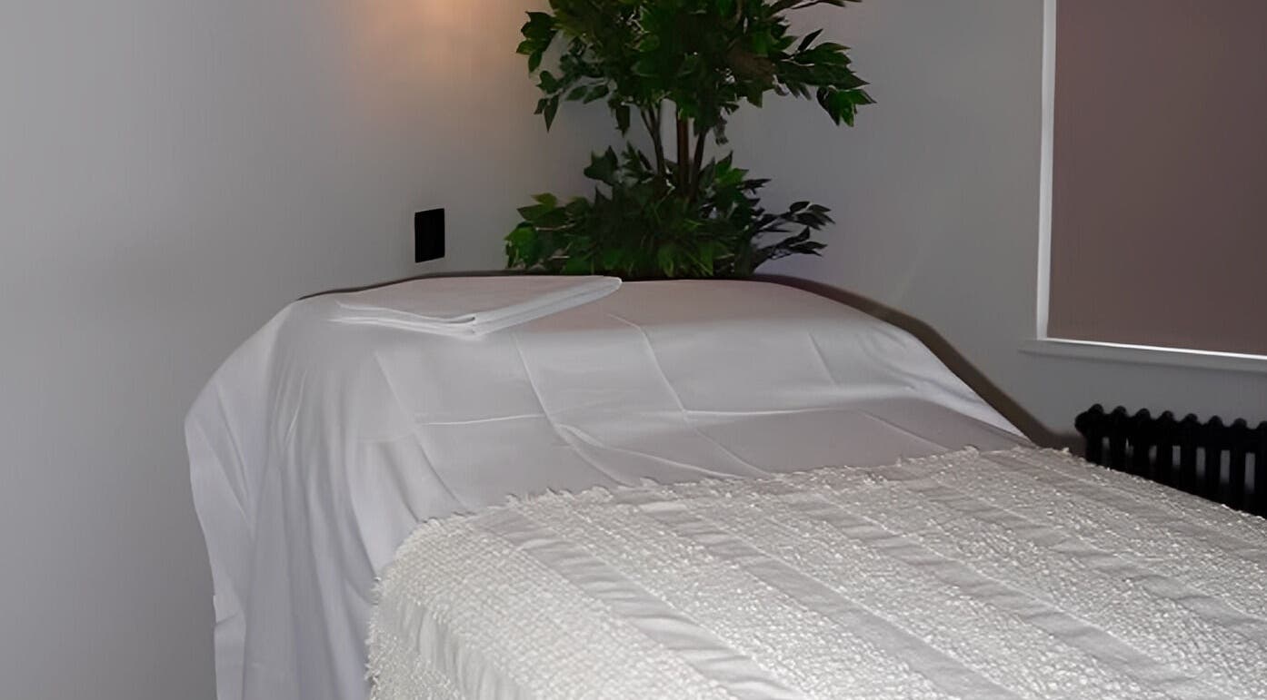 Tranquil spa room at Figured It in Hessle, England, GB with a massage table and calming decor.