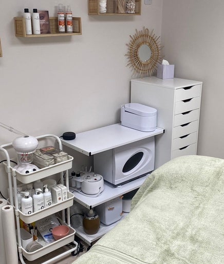 Calm treatment room at Beauty By Tash, Andover, England, GB, showcasing spa essentials and a cozy bed.