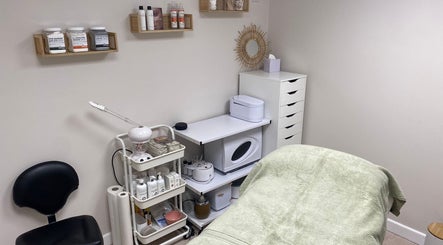Calm treatment room at Beauty By Tash, Andover, England, GB, showcasing spa essentials and a cozy bed.