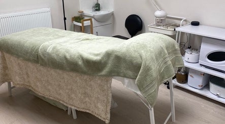 Beauty By Tash treatment room with massage table in Andover, England, GB, ready for clients.
