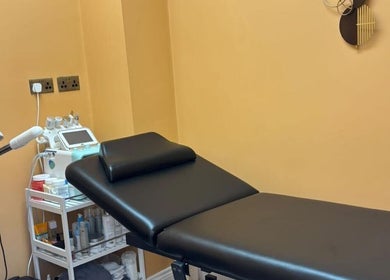 Treatment room at Belinda Ro, WhitleyBay, England, GB, featuring a massage bed and spa equipment.
