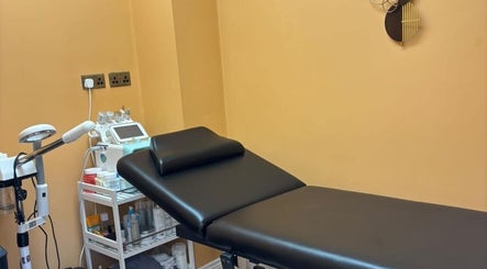 Treatment room at Belinda Ro, WhitleyBay, England, GB, featuring a massage bed and spa equipment.