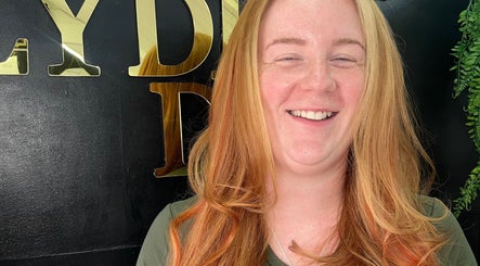 Happy customer with vibrant hair color at Hair by Lydia Dion in Leicester, England, GB.