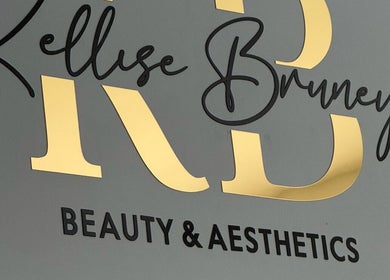 Logo of Kellise Bruney Beauty and Aesthetics in Willington, England, GB with gold and black lettering.