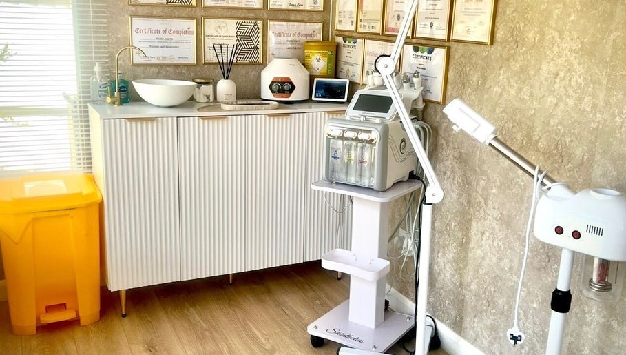 Modern treatment area at Skinthetics Studio, Droitwich Spa, England, GB with advanced skincare equipment.