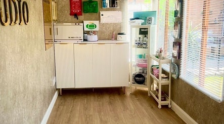 Skinthetics Studio's well-lit treatment area with skincare products in Droitwich Spa, England, GB.