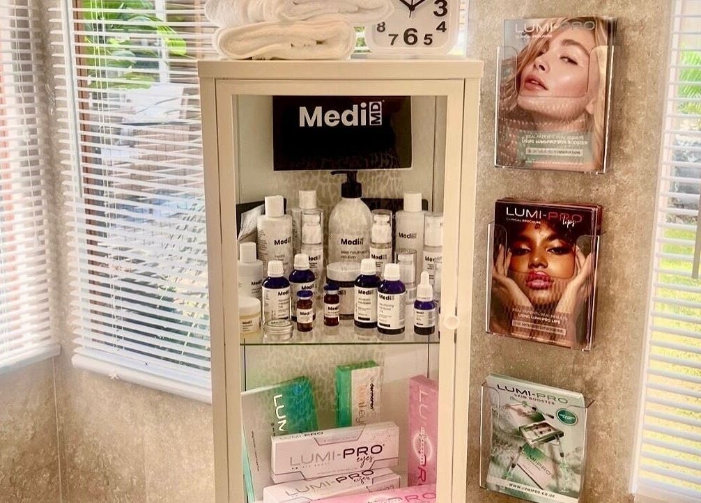 Product display in Skinthetics Studio, Droitwich Spa, England. Serene beauty corner with skin care items.