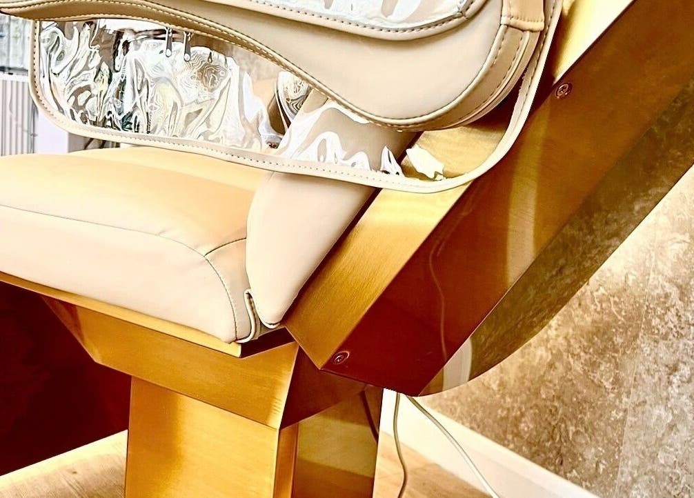 Luxurious treatment chair at Skinthetics Studio in Droitwich Spa, England, GB, emphasizing comfort and style.