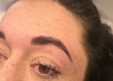 Detailed brow shaping at RAE - Shade Salon, Worsley, England, GB enhances natural beauty.