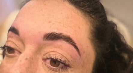 Expert eyebrow shaping at RAE - Shade Salon, Worsley, England, GB showcasing beautifully styled brows.