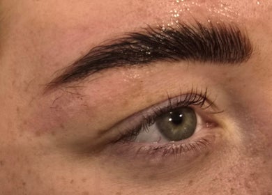 Expert brow styling at RAE - Shade Salon, Worsley, England, GB. Enhance your look with precision shaping.