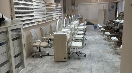 Modern nail salon interior at Mystic Sirens Nail Boutique, Las Vegas, Nevada, US, featuring professional workstations.