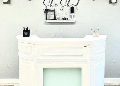Reception desk at Skin 2 Live 4 in Bowie, Texas. A welcoming and elegant ambiance.