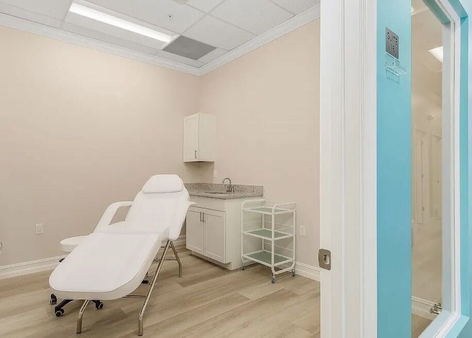 Relaxing treatment room at Glow Romantique, Palm Harbor, Florida, US, featuring a modern reclining chair.