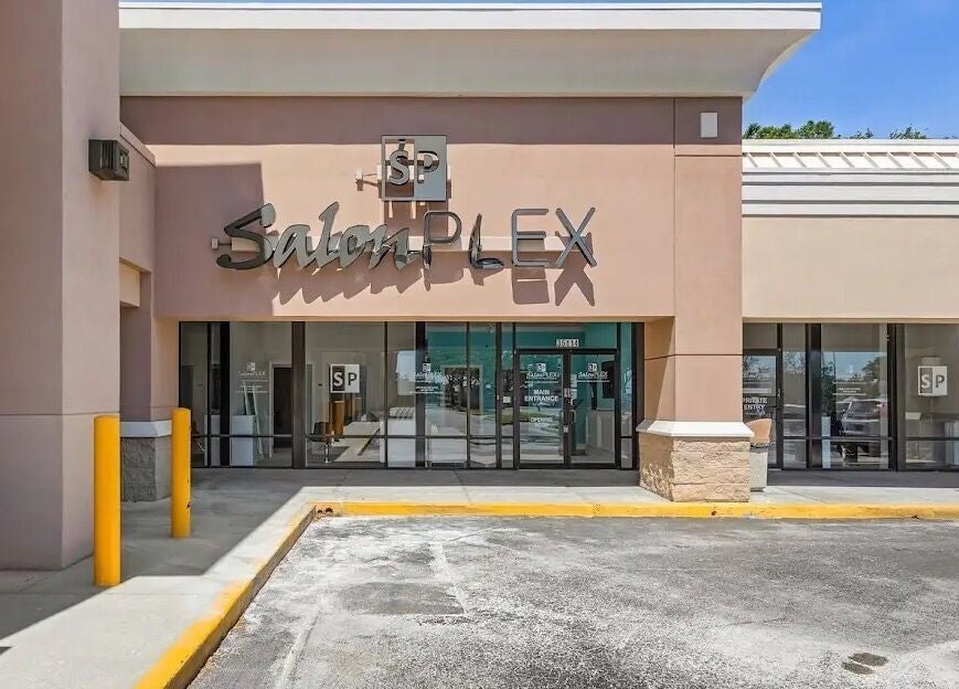 Front exterior of Glow Romantique, Palm Harbor, Florida, US showcasing the elegant entrance.