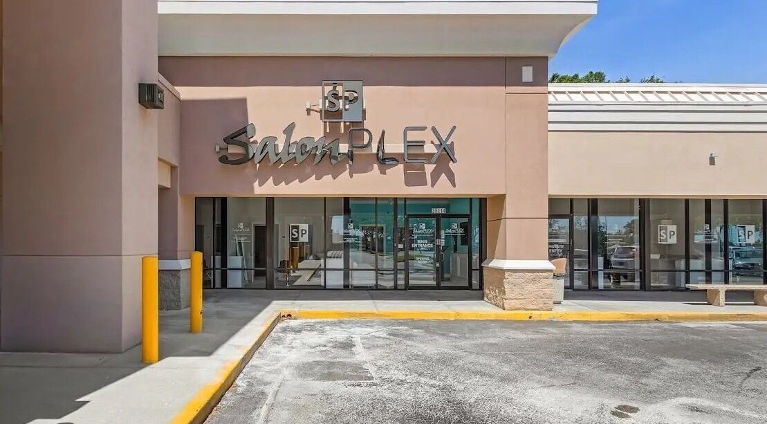 Front exterior of Glow Romantique, Palm Harbor, Florida, US showcasing the elegant entrance.