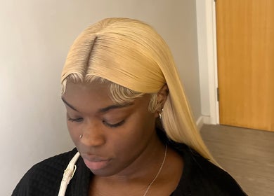 Blonde hairstyle showcased at kmstylesuk, located in Leicester, England, GB, highlighting sleek hair design.