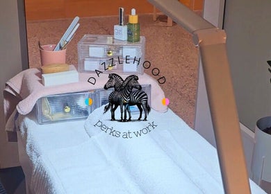 Relaxing spa room at Dazzlehood at Meta, Dublin, County Dublin, IE. Cozy treatment area with products.