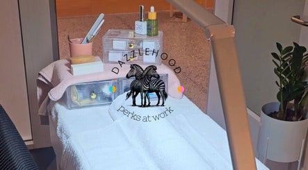 Relaxing spa room at Dazzlehood at Meta, Dublin, County Dublin, IE. Cozy treatment area with products.