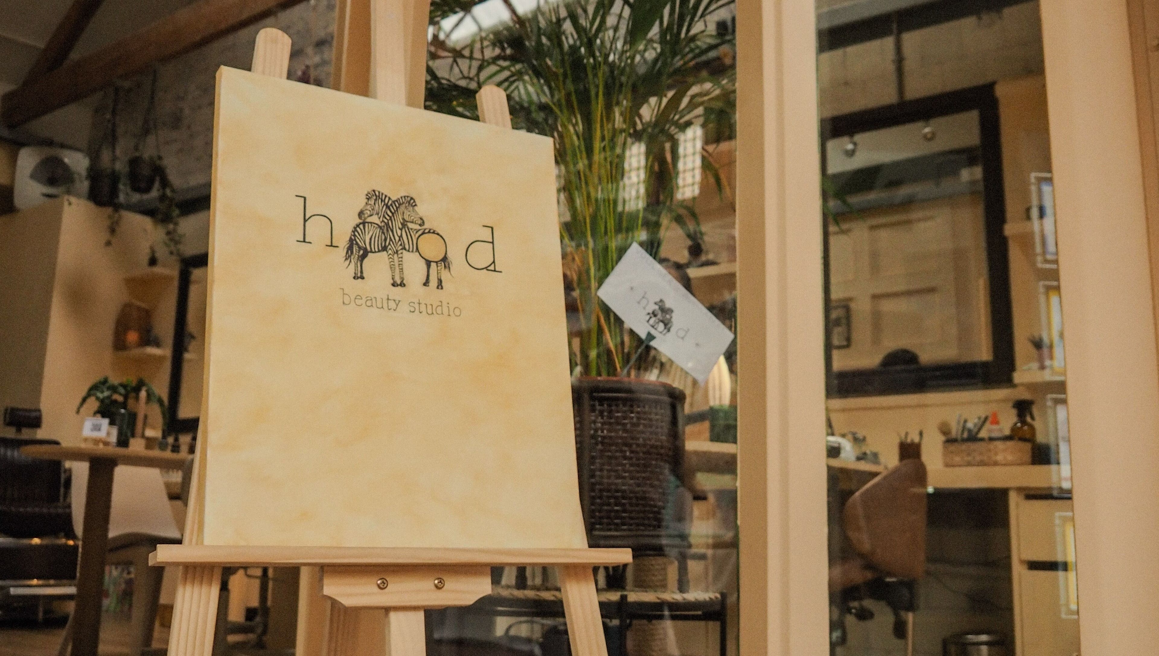 Elegant interior of Hood Beauty Studio, Dublin, County Dublin, IE, showcasing a cozy and artistic ambiance.