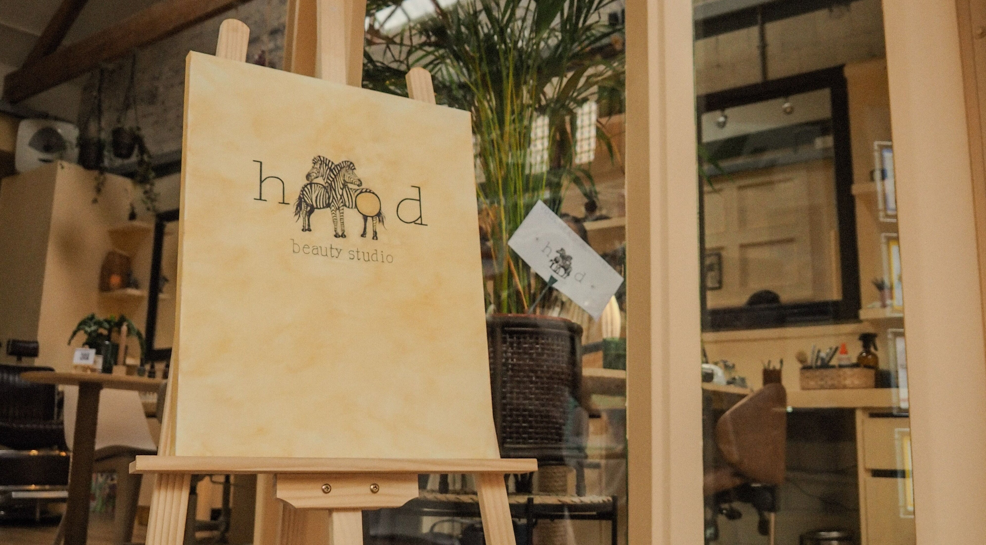 Elegant interior of Hood Beauty Studio, Dublin, County Dublin, IE, showcasing a cozy and artistic ambiance.