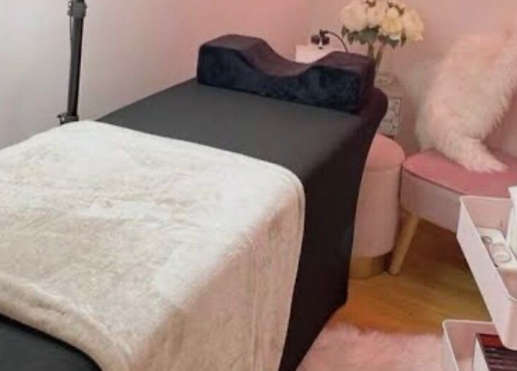 Cozy treatment bed and decor in KK Lashes, Hamilton, Waikato Region, NZ.
