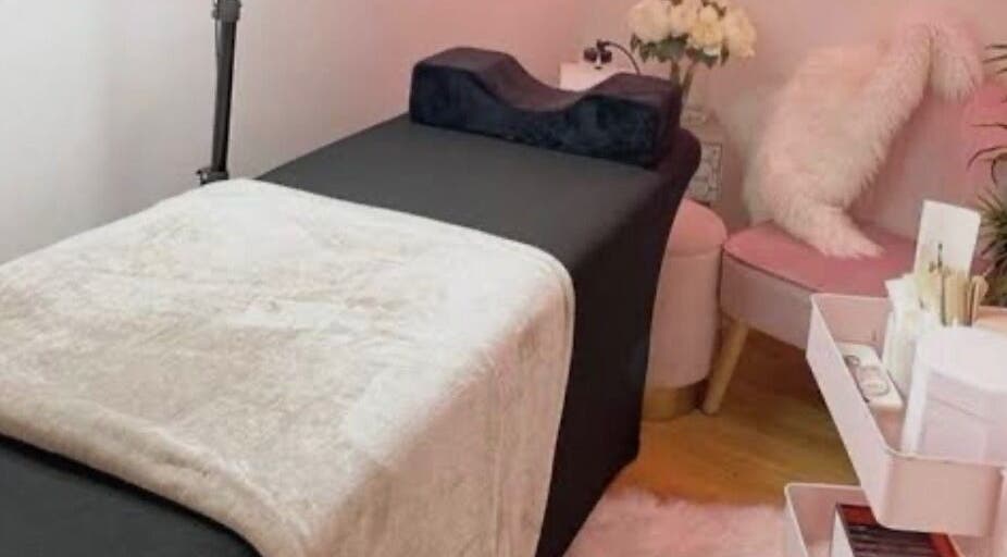 Cozy treatment bed and decor in KK Lashes, Hamilton, Waikato Region, NZ.